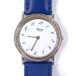 HERMES - a stainless steel Arceau quartz wristwatch, white dial with painted Arabic numerals and