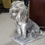 A large-scale weathered concrete garden statue of a lion, overall height 94cm Very good condition,