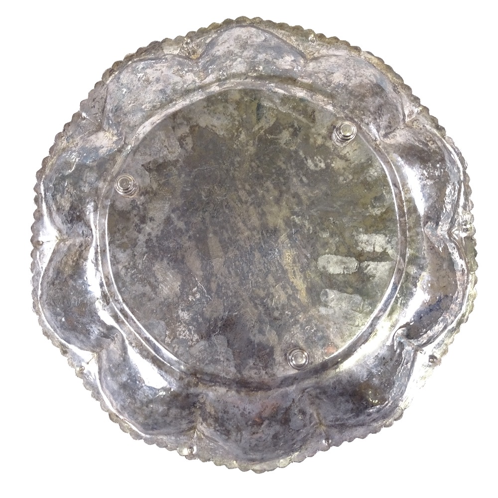 A large Indian white metal circular tray, floral swag and eternal knot decoration with scalloped - Image 4 of 4