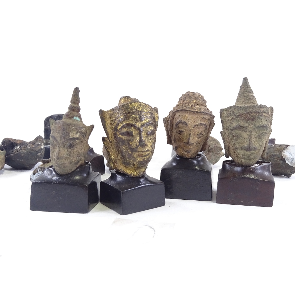 10 miniature cast bronze Thai Buddha heads, with later made hardwood stands, tallest 6cm with stand. - Image 5 of 5
