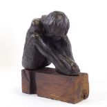 Clive Fredriksson, bronze patinated composition seated figure on wood plinth, overall height 8.5"