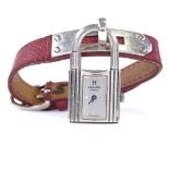HERMES - a lady's silver-cased Kelly padlock quartz wristwatch, silvered dial with quarterly dot