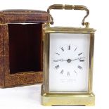 A 19th century brass-cased carriage clock, by Olliva & Botsford, plate no. 1661, height 12cm, in