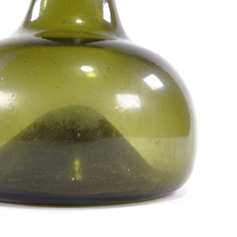 An 18th century handmade green glass onion-shaped bottle, height 17cm - Image 4 of 6