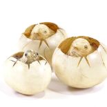 3 Japanese ivory hatching chicks in egg, smallest is a netsuke with signature to base, largest 5cm