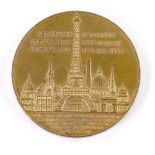 An 1889 gilt copper souvenir Eiffel Tower ascension medal, diameter 4.5cm Good original condition,