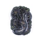 A Chinese relief carved and jade pendant, length 5cm