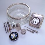 A plated travel pocket watch in a silver-fronted travelling case, silver-topped bottles, an Alpaca