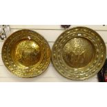 2 large brass chargers, food gathering and Adam and Eve scenes, largest diameter 43cm (2)