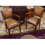 A pair of French leather-upholstered bridge chairs