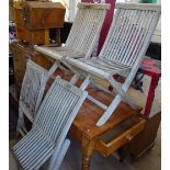 A set of 4 hardwood folding garden chairs