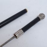 An ebonised bamboo sword stick walking cane, unmarked white metal mounts and blade marked Etoile-