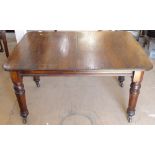 An Edwardian mahogany dining table, on turned baluster legs (no winding movement), L126cm