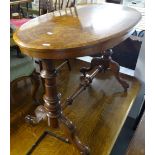 A Victorian walnut and marquetry decorated stretcher table, with oval top, on turned legs