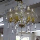 A Murano glass 6-branch chandelier with tear-shape drops and speckled gilded bowl shades