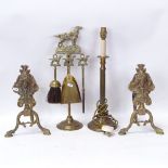 Various brass fireside ornaments, including pair of fire dogs, and a brass table lamp (3)