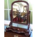 A Victorian mahogany arch-top swing toilet mirror, W56cm