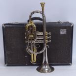 A CG Conn Ltd Constellation silver plated 3-valve long cornet, serial no. N18564, length 43cm, in