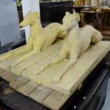A pair of concrete garden statues, study of recumbent hounds, L123cm