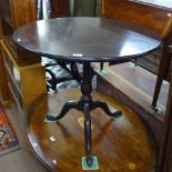 A Georgian mahogany tilt top table, with birdcage mechanism, on tripod base