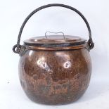 A 19th century copper cauldron/coal bin and cover, height 26cm