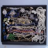 A tray of costume jewellery, to include a Komai fan-design 10-panel bracelet, a Komai butterfly