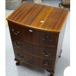 A walnut bow-front 3-drawer chest on cabriole legs, W45cm