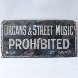 A Vintage black and white enamel Organs and Street Music Prohibited warning sign, length 46cm