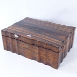 A rosewood sewing box, ivory inlaid lid with removable tray and shaped outline, box width 38cm