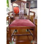 A Georgian mahogany desk chair with upholstered drop-in seat