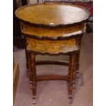 A nest of 3 1930s burr-walnut oval occasional tables
