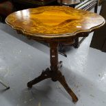 An Antique walnut and marquetry decorated tripod occasional table, W63cm