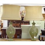 A pair of Italian green glazed ceramic baluster shaped table lamps and shades, height to top of