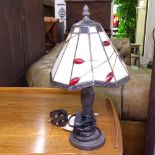A Tiffany style uplighter with leadlight shade, and a small Tiffany style table lamp with