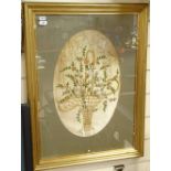 A 19th floral silk embroidery, depicting basket of spring flowers, in gilt frame, frame height 63cm