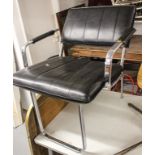 A Vintage chrome and leather-upholstered low armchair