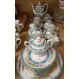 1930s Crown Staffordshire coffee service for 11 people, with floral frieze on blue and white ground