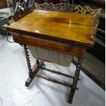 A Victorian rosewood sewing table, with raised pierced gallery, fitted frieze drawer, with sewing
