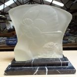 An Art Deco moulded glass portrait of a girl and flower, on stepped marble plinth, height 25cm