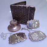 A small silver Capstan inkwell, monogram O.M.W., 2 English hallmarked silver decanter labels,
