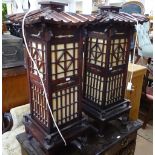 A pair of Chinese design electric lanterns in the form of pagodas, W35cm, H84cm