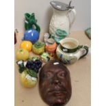 A Victorian jug, 26cm, character jugs, a mask etc