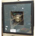 A Thai silver plated Ken Dedes ornamental mask, framed, frame height 38cm