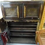 18th century French cherry wood display shelves, with decorated copper panelled cupboards above,