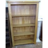 A modern oak floor standing open bookcase, W96cm