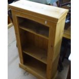 A narrow pine 3-tier open bookcase, W60cm