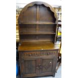 A Dutch style oak dome-top dresser, with drawers and cupboards fitted to the base, W91cm