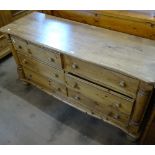 A pine chest of 6 short drawers, with split-turned pillisters, on bun feet, W125cm