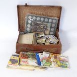 A Vintage leather-covered briefcase, containing various cigarette cards, historic car coins etc
