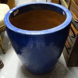 A blue glazed ceramic garden planter, H56cm